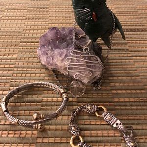 silver necklace and two bracelets